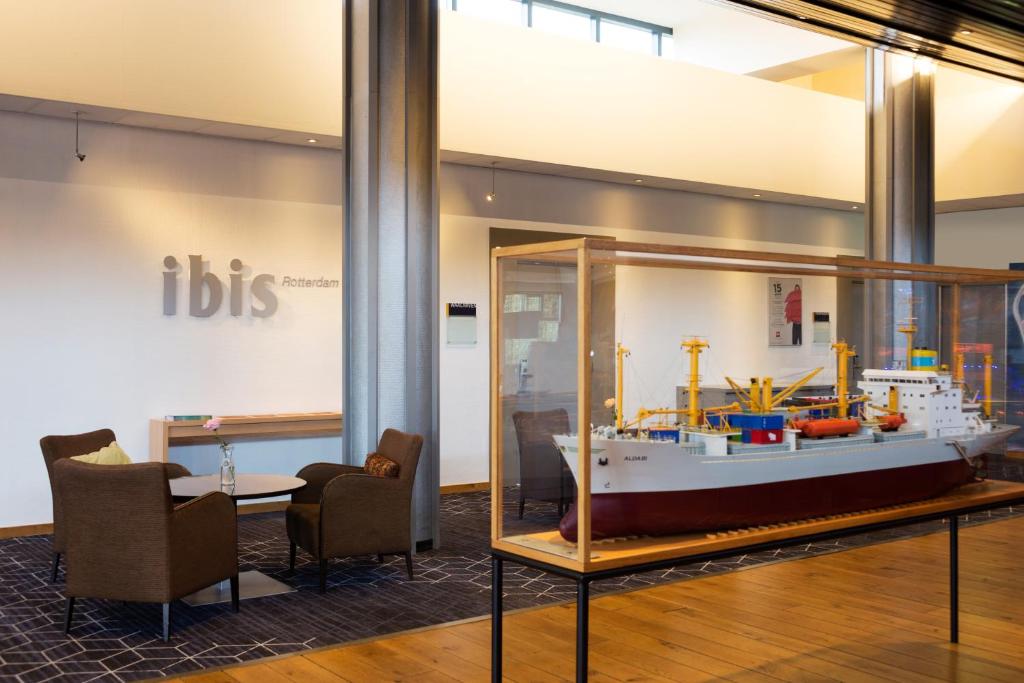 a model of a boat on display in a room at ibis Rotterdam Vlaardingen in Vlaardingen