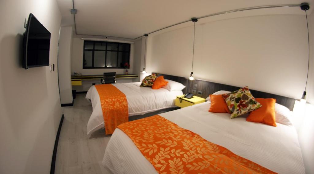Postel nebo postele na pokoji v ubytování Hotel RDOS