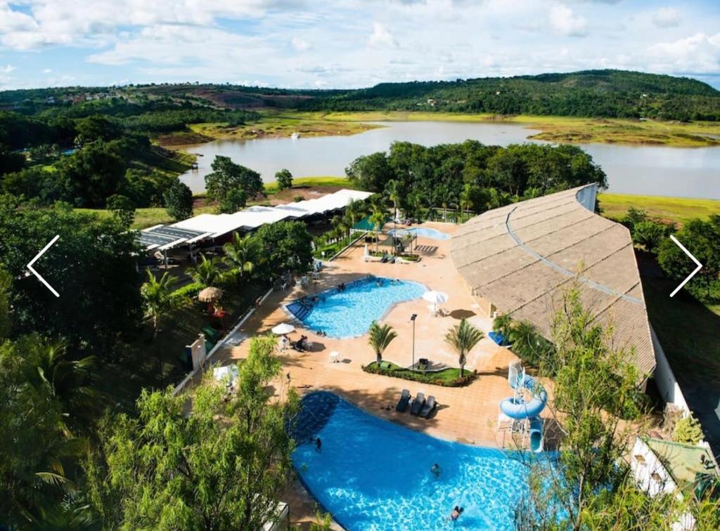 an aerial view of a resort with two swimming pools at Apartamento em Caldas Novas in Caldas Novas