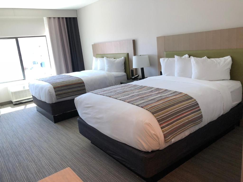 Postel nebo postele na pokoji v ubytování Country Inn & Suites by Radisson, Page, AZ