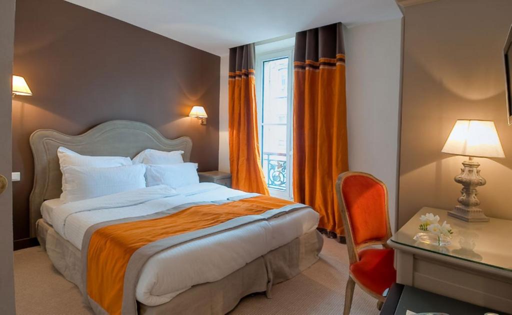 Poste&#x13E; alebo postele v izbe v ubytovan&iacute; Hotel Cluny Square