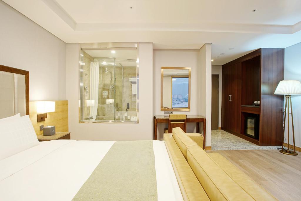Postel nebo postele na pokoji v ubytování Stanford Hotel Busan