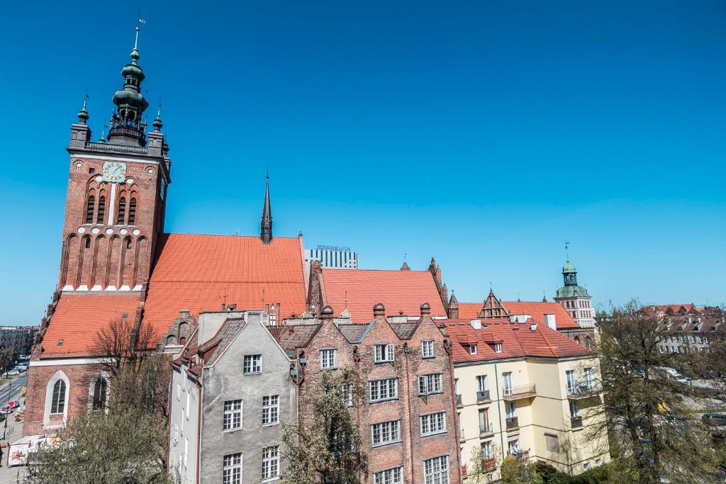 Nespecifikovaný výhled na destinaci Gdaňsk nebo výhled na město při pohledu z apartmánu