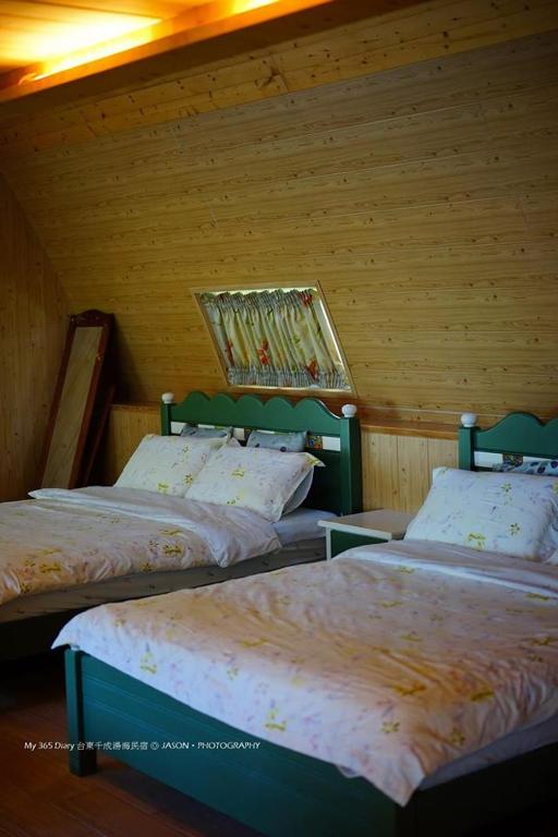 Postel nebo postele na pokoji v ubytování Knt House