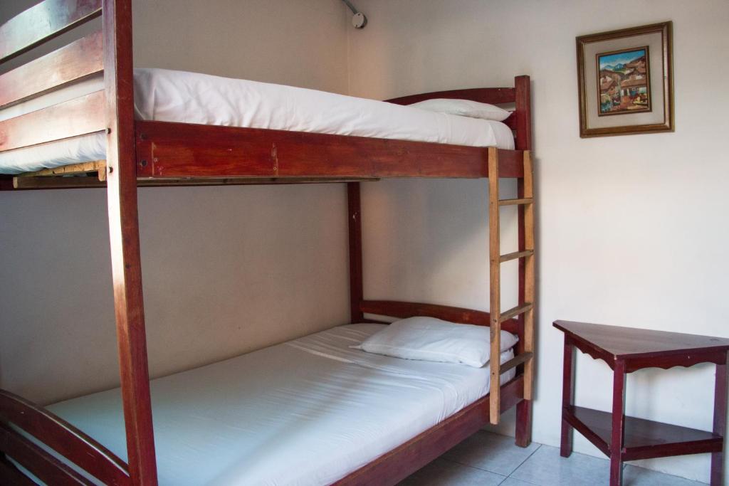 Postel nebo postele na pokoji v ubytování Dreamkapture Hostel close to the airport and bus terminal