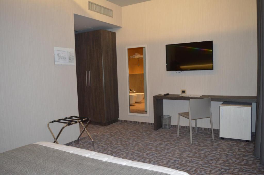 TV a/nebo společenská místnost v ubytování Hotel Enjoy