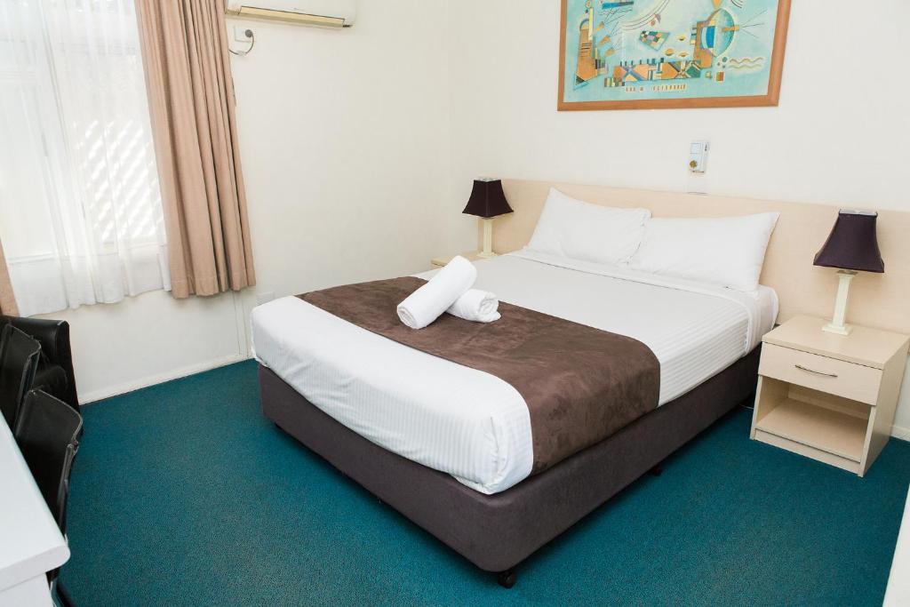 Postel nebo postele na pokoji v ubytování Bentleigh Motor Inn