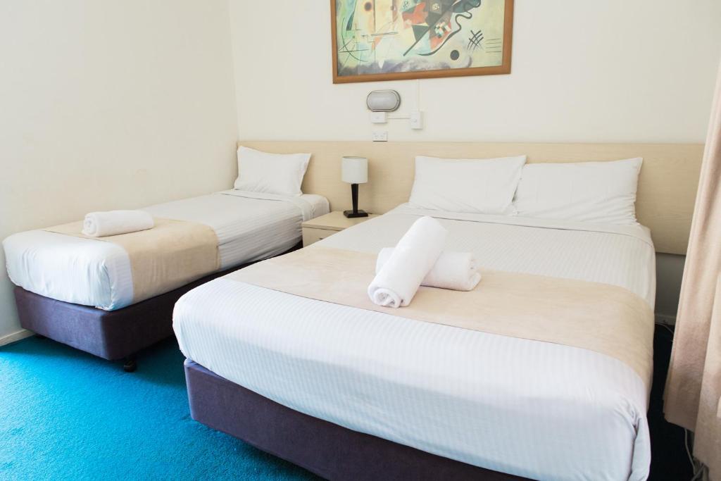 Postel nebo postele na pokoji v ubytování Bentleigh Motor Inn