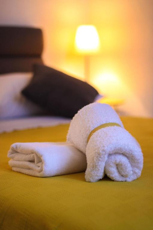 Postel nebo postele na pokoji v ubytování Apartments Kut