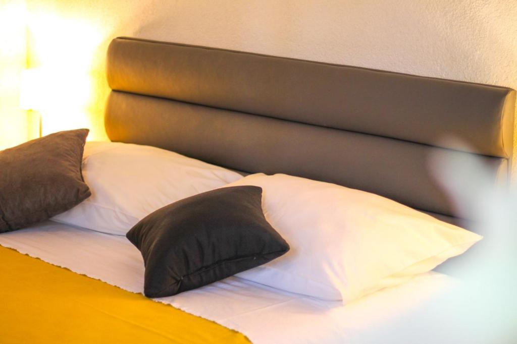 Postel nebo postele na pokoji v ubytování Apartments Kut