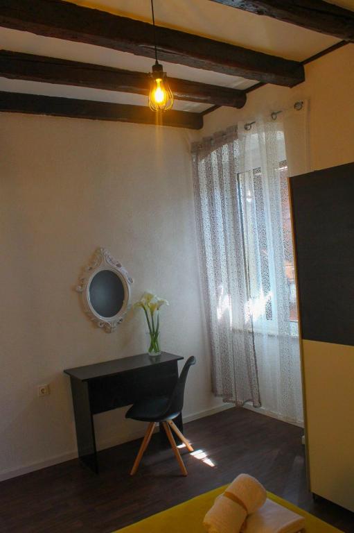 TV a/nebo společenská místnost v ubytování Apartments Kut