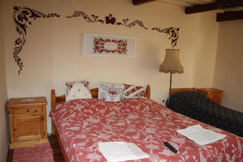 Postel nebo postele na pokoji v ubytování Apartment Petefi