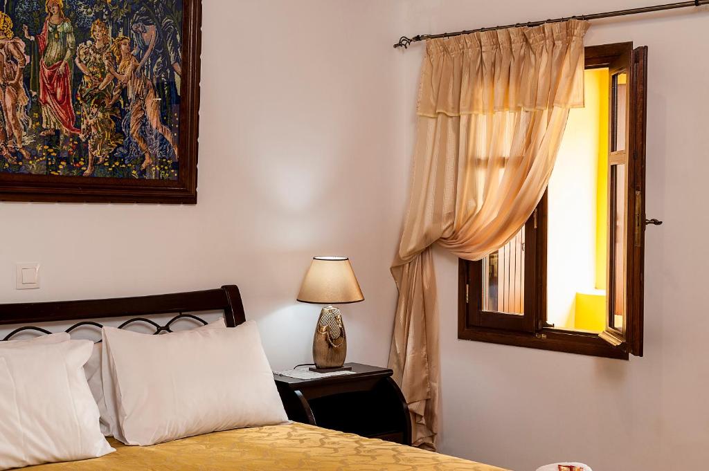 Postel nebo postele na pokoji v ubytování Hamam Suites Sifaka