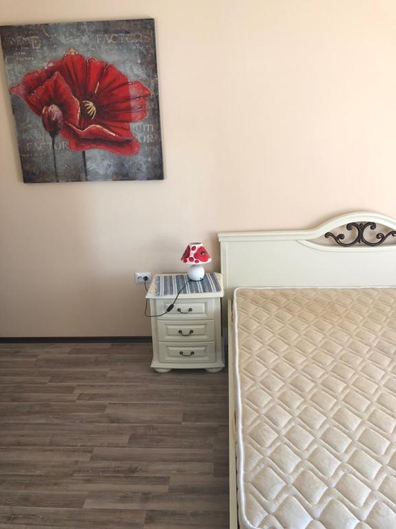 Postel nebo postele na pokoji v ubytování Tatyana Apartment