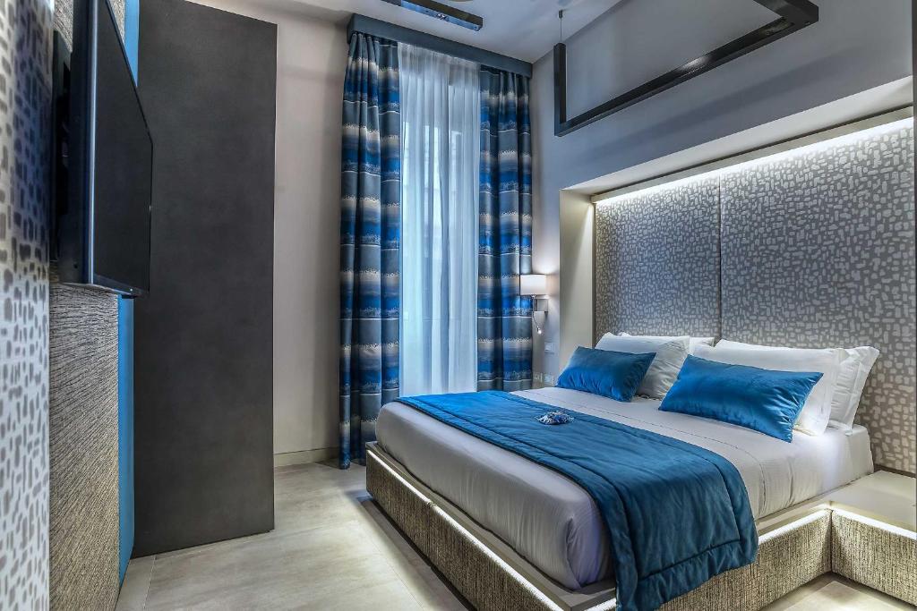 Posteľ alebo postele v izbe v ubytovaní Via Veneto Prestige Rooms