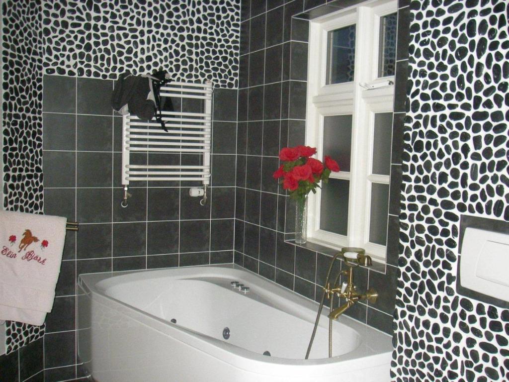 Koupelna v ubytování Guesthouse Storu-Laugar