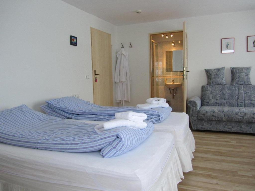 Postel nebo postele na pokoji v ubytování Guesthouse Storu-Laugar