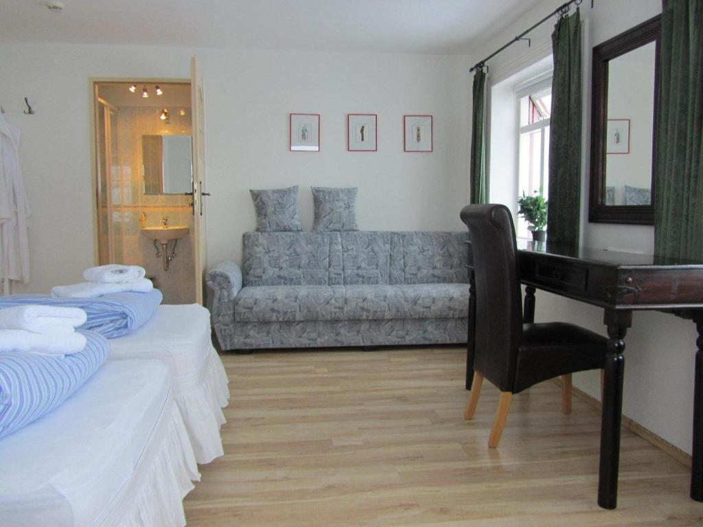 Postel nebo postele na pokoji v ubytování Guesthouse Storu-Laugar
