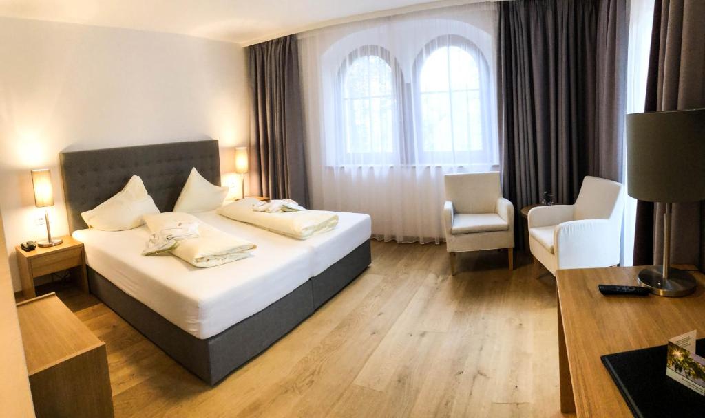 Postel nebo postele na pokoji v ubytování Hotel Lambrechtshof