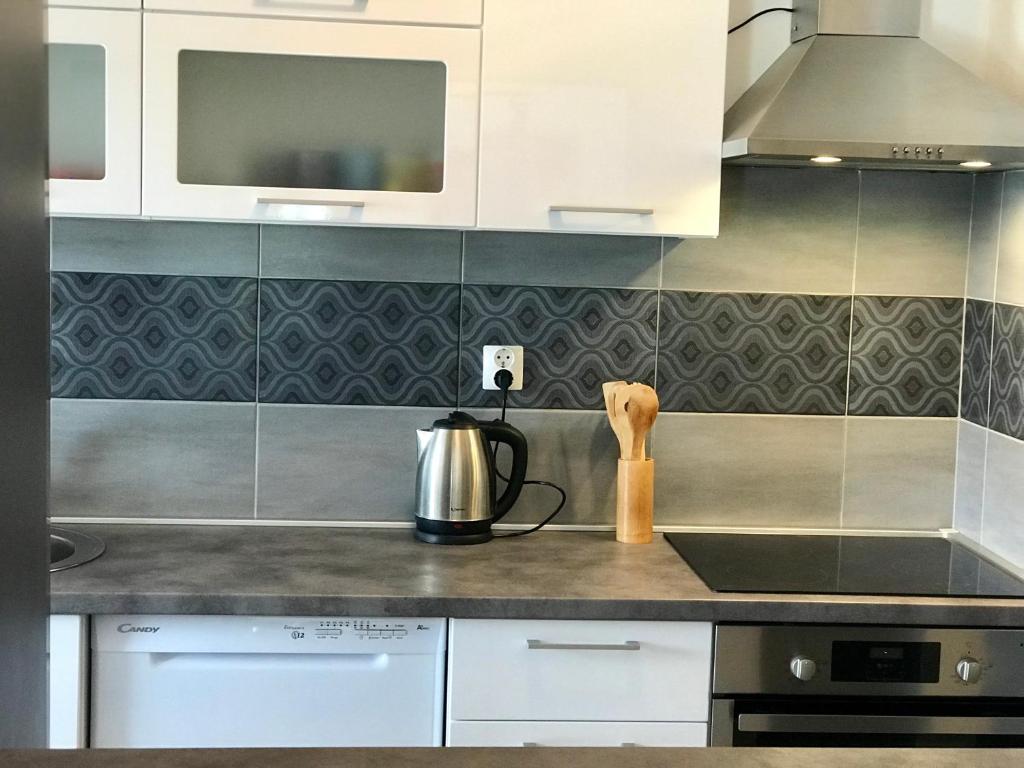 Kuchyňa alebo kuchynka v ubytovaní Aparment Jomarko