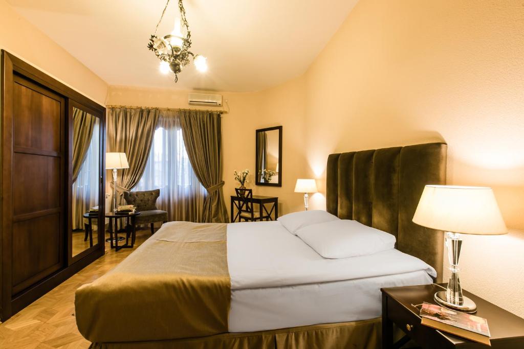 Postel nebo postele na pokoji v ubytování Hotel VIP