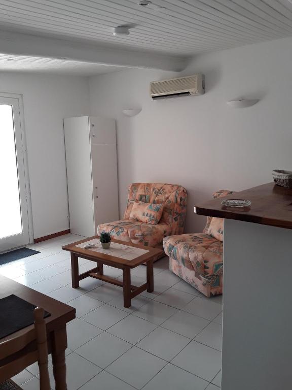 Posezení v ubytování Camping Residence Chalet La Pomposa Terrazzoni