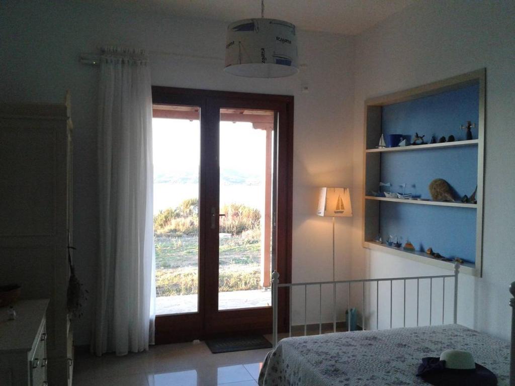 Postel nebo postele na pokoji v ubytování Marvelous Sea View Eco Studio