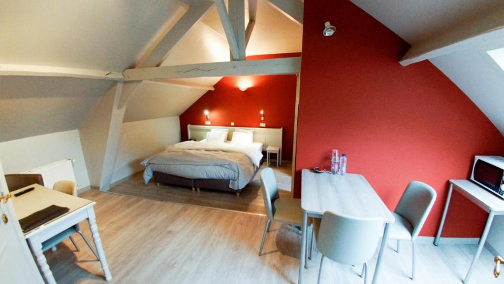 Postel nebo postele na pokoji v ubytování B&B Ter Gracht