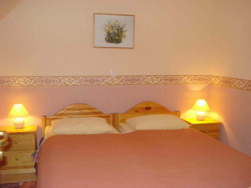 Postel nebo postele na pokoji v ubytování Villa Johanna Guesthouse