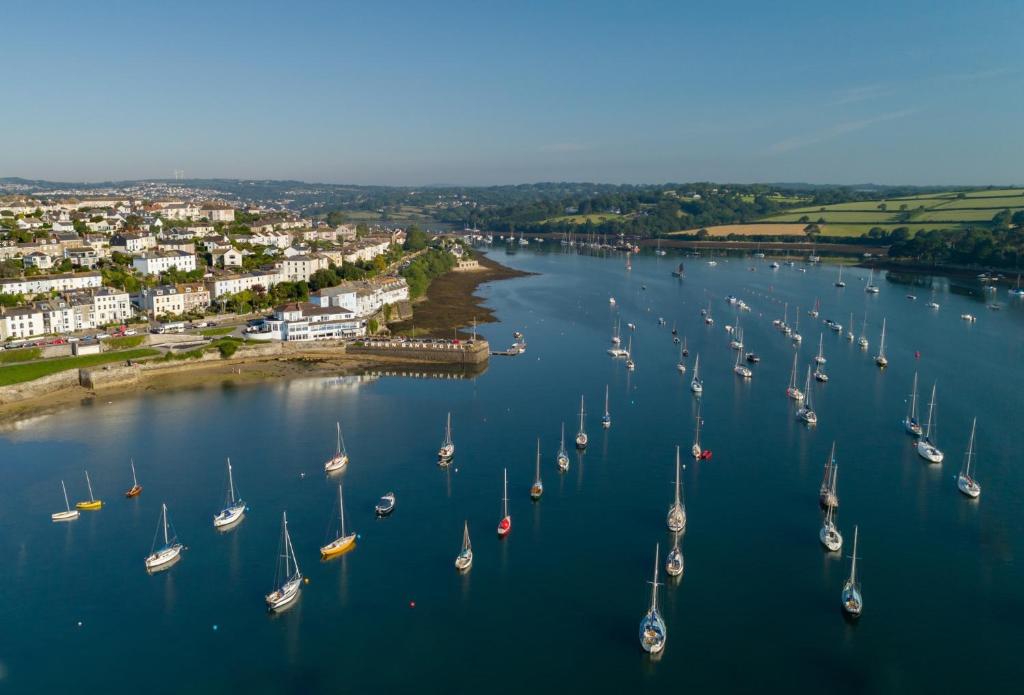 an aerial view of a harbor with boats in the water at Greenbank Hotel in Falmouth