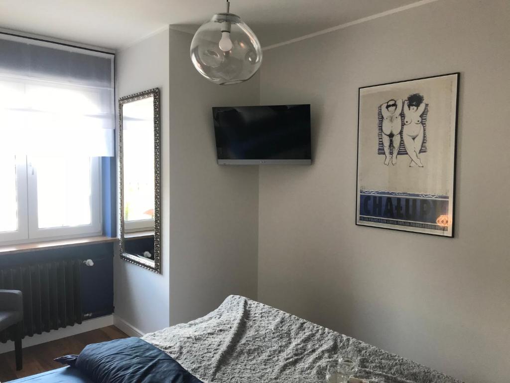 Posteľ alebo postele v izbe v ubytovaní Apartament 27