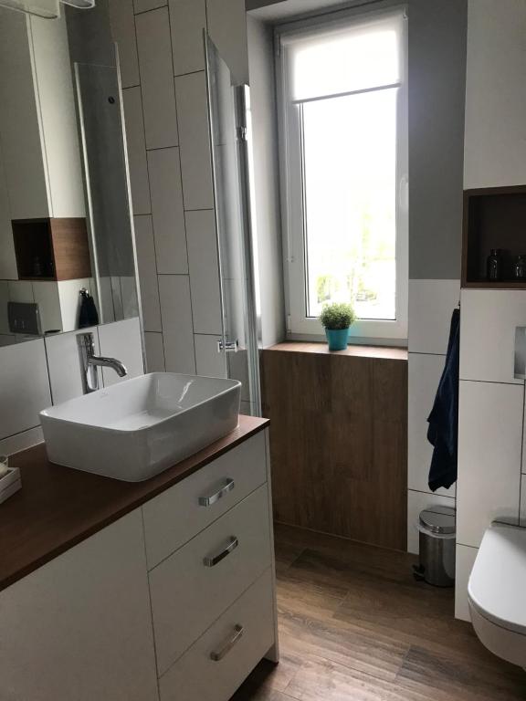 Kúpeľňa v ubytovaní Apartament 27