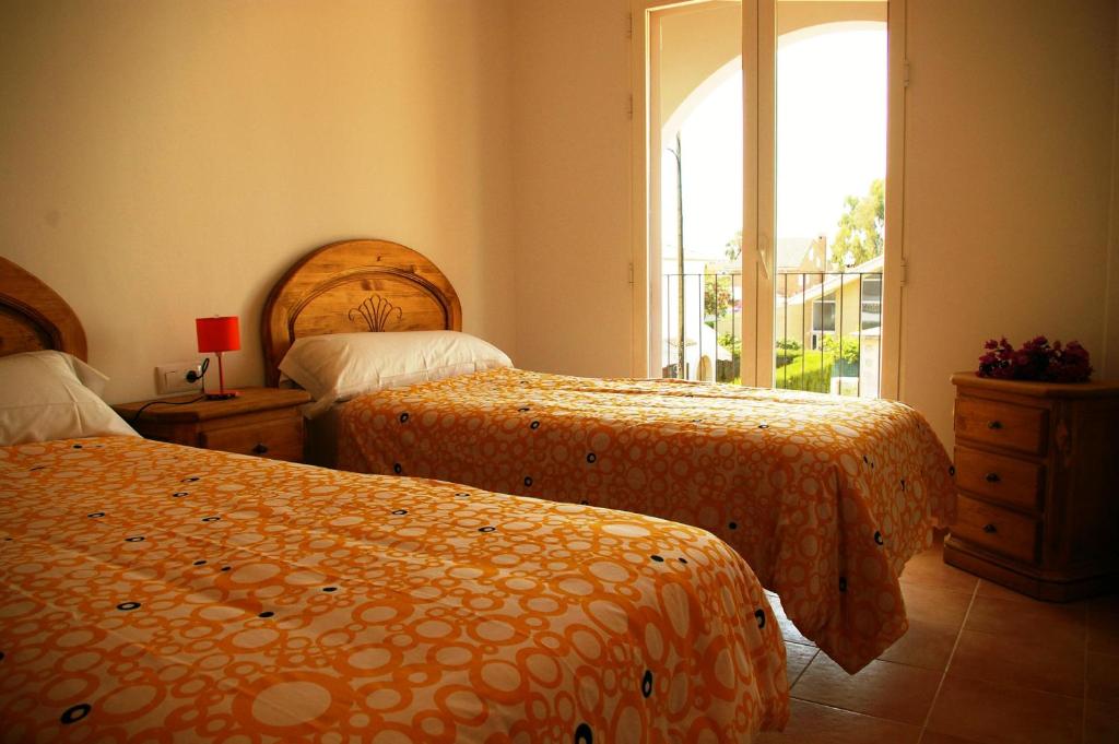 Postel nebo postele na pokoji v ubytování Apartamentos Concha del Mar