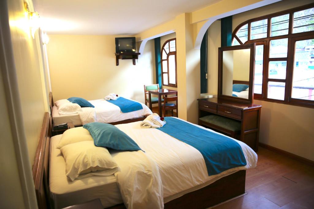 Postel nebo postele na pokoji v ubytování Hotel Donde Marcelo