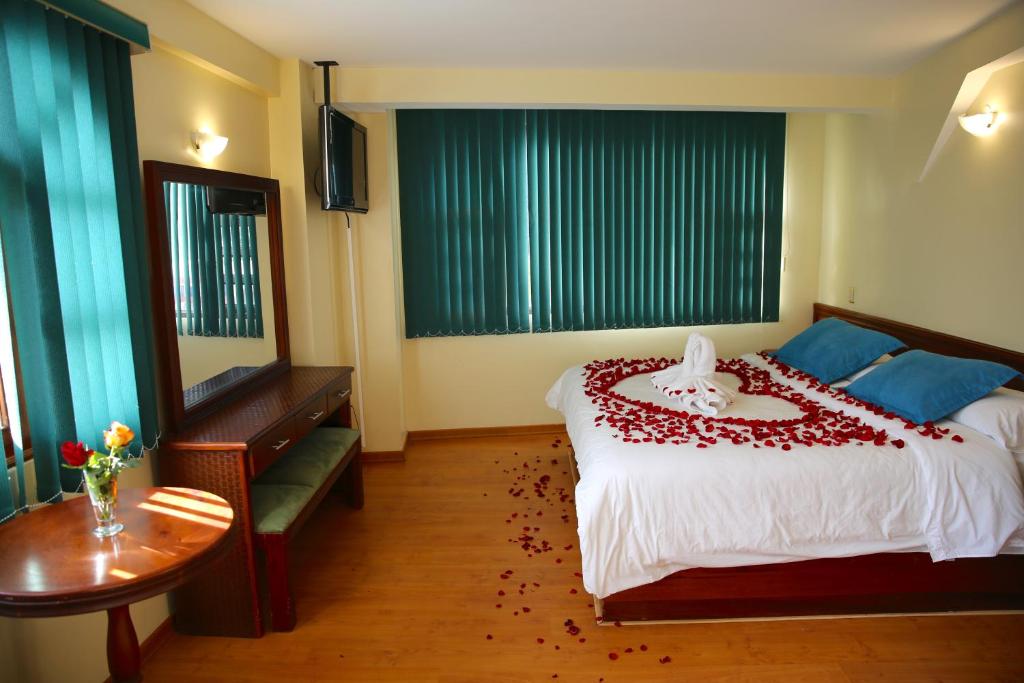 Postel nebo postele na pokoji v ubytování Hotel Donde Marcelo