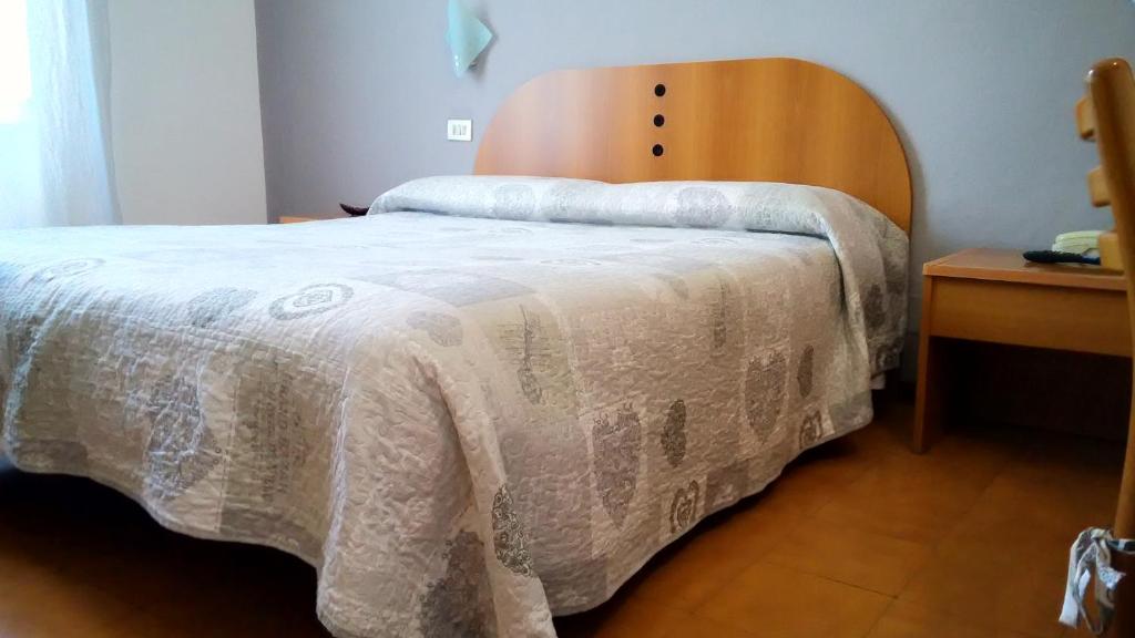 Postel nebo postele na pokoji v ubytování Hotel Tirreno