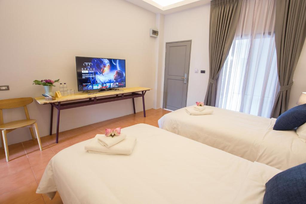 TV a/nebo společenská místnost v ubytování VIYA lodge