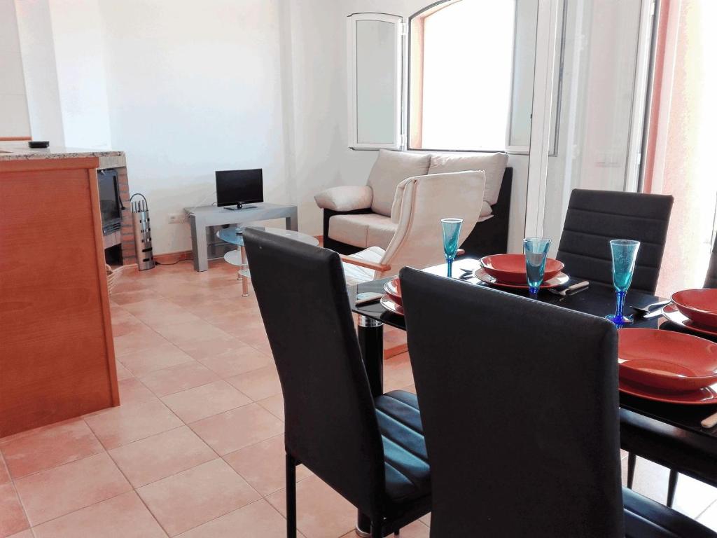 TV a/nebo společenská místnost v ubytování Apartamentos Concha del Mar