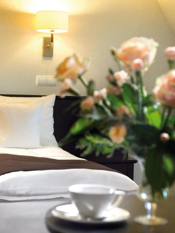 Posteľ alebo postele v izbe v ubytovaní Hotel Senator