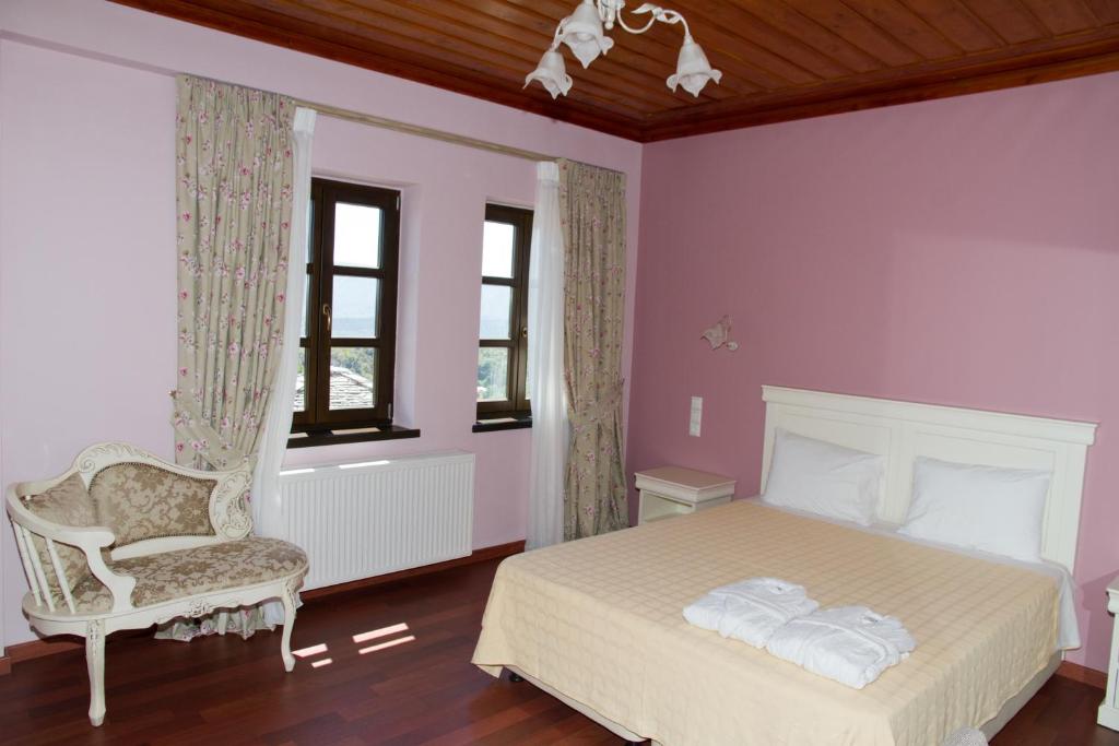 Rúm í herbergi á Hotel Monodendri