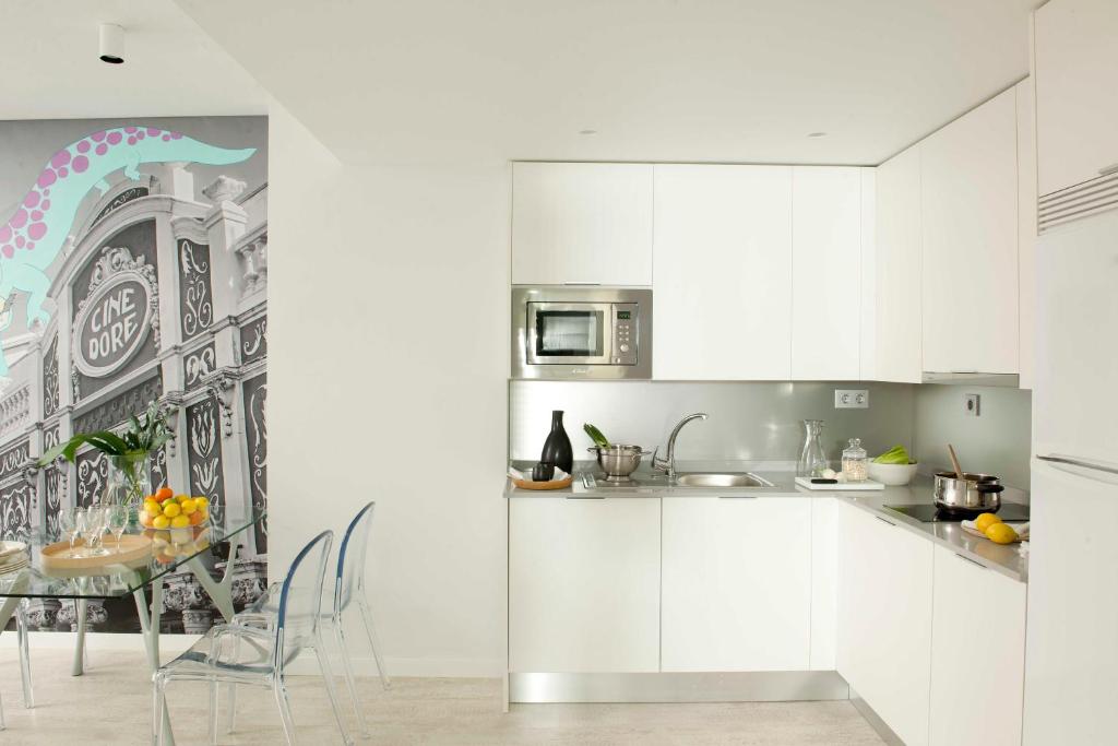 Kuchyň nebo kuchyňský kout v ubytování Eric Vökel Boutique Apartments - Atocha Suites