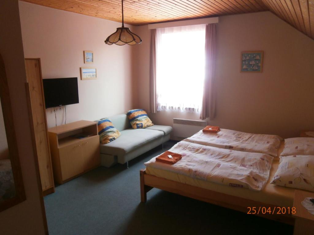 Postel nebo postele na pokoji v ubytování Penzion Oliver
