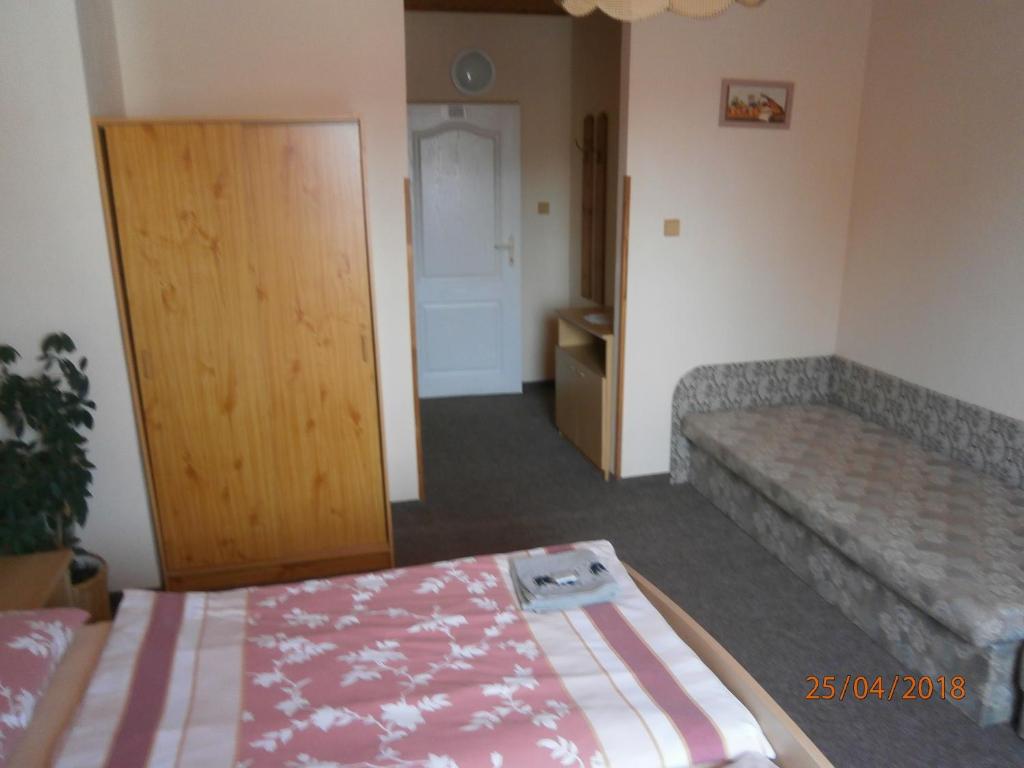 Postel nebo postele na pokoji v ubytování Penzion Oliver
