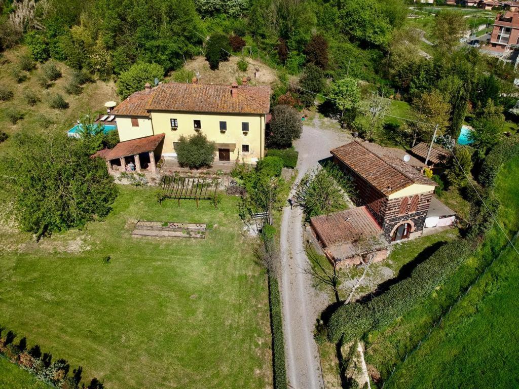 an aerial view of a house with a yard at Fienile Da Primo in San Giovanni Valdarno