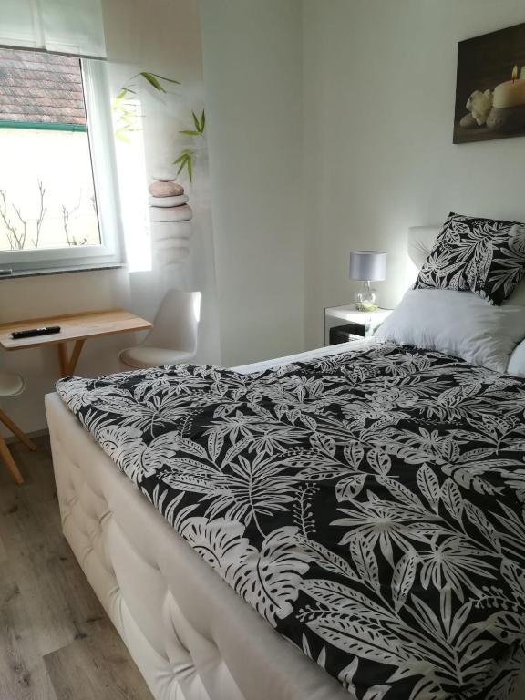 Postel nebo postele na pokoji v ubytování Gästezimmer Resi