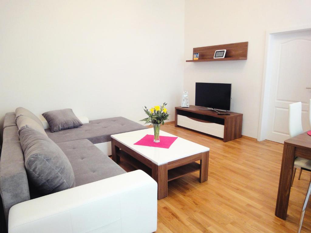 TV a/nebo společenská místnost v ubytování Exclusive Vienna Apartment