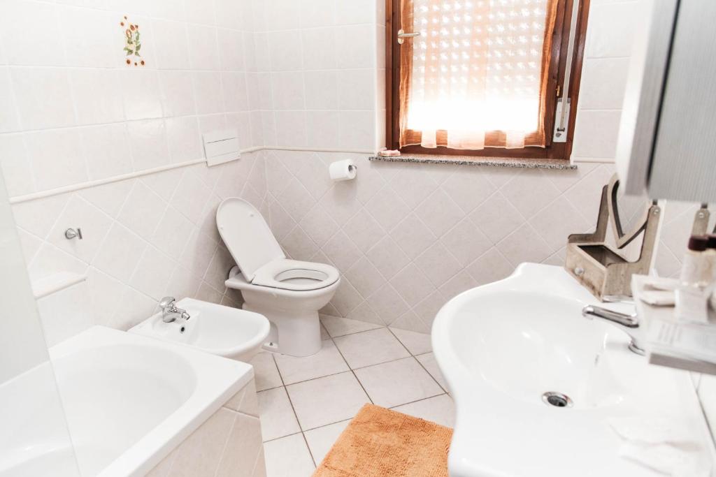 A bathroom at Gadem Apartment