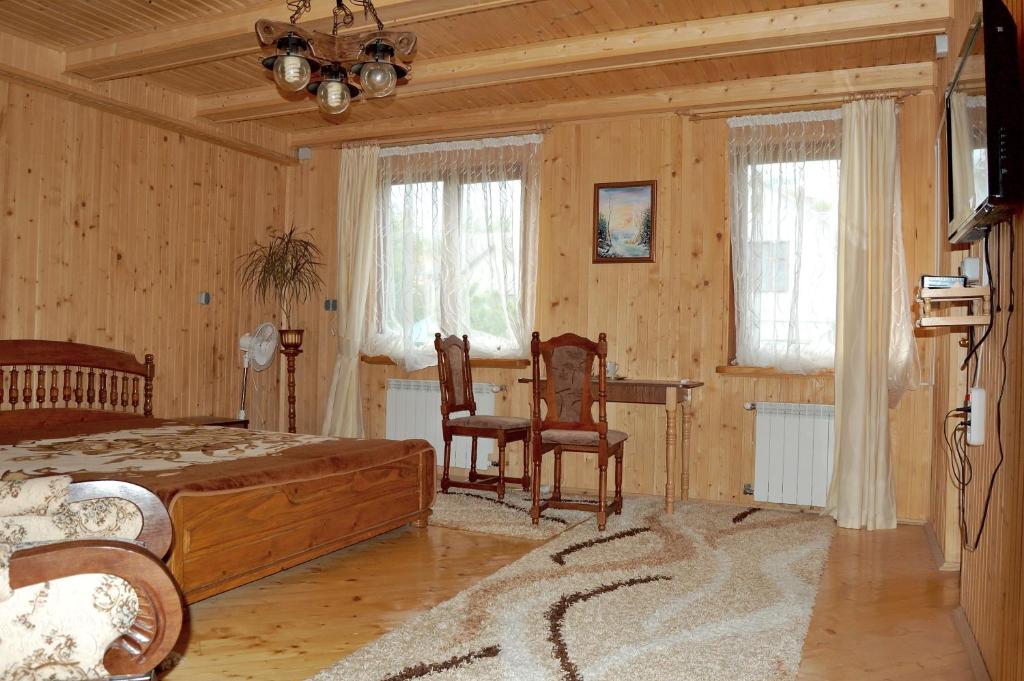 Postel nebo postele na pokoji v ubytování U Olgi
