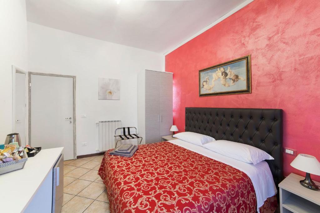 A bed or beds in a room at B&B La Cittadella