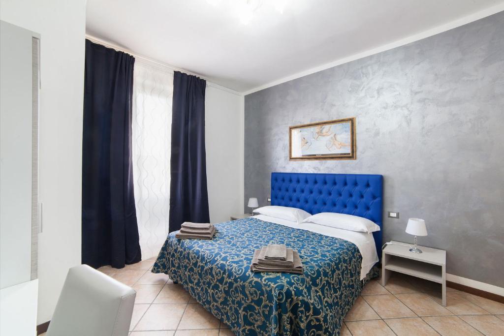 A bed or beds in a room at B&B La Cittadella